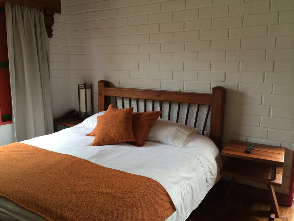 מלון מניזאלס Termales El Otono מראה חיצוני תמונה A bedroom at the hotel